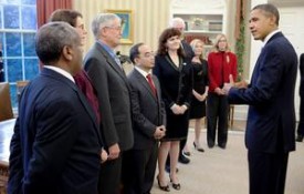 Image: Professor Karen Panetta, creator of Nerd Girls, receives and award and congratulations from President Obama for her work in engineering outreach.